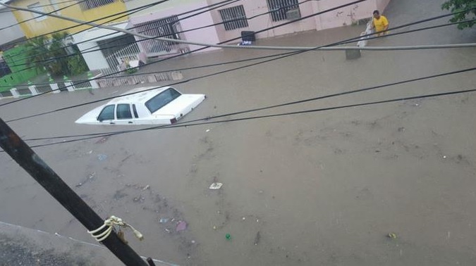 Lluvias dejan dos muertos e inundaciones en varias comunidades del Cibao